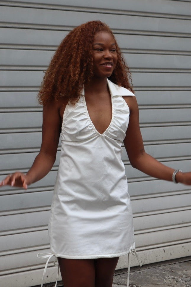 number 33 white short dress with an open back in cotton